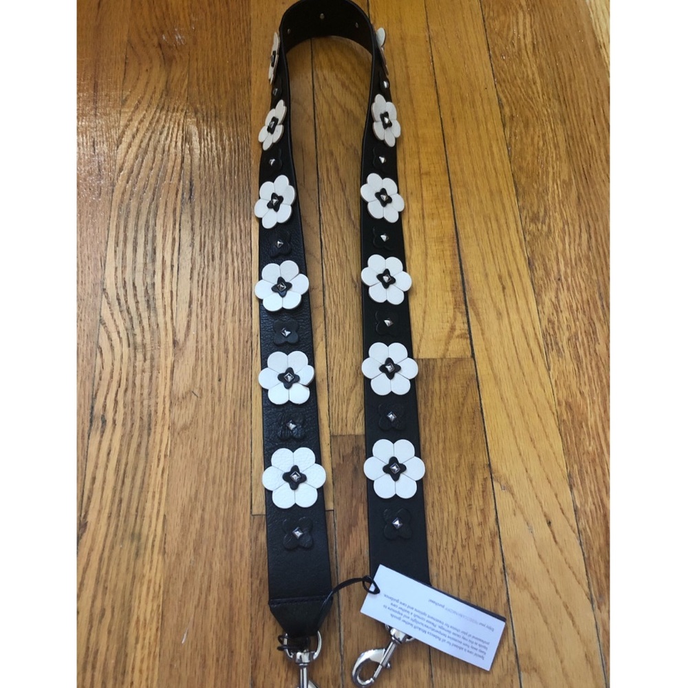 Guitar strap / bag strap.